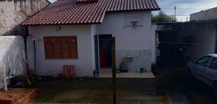 CASA EM FRENTE ASFALTO